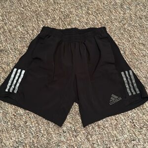 Men’s adidas running shorts size M7.